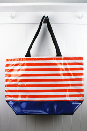 sarahjane oilcloth beach bag orange stripe with blue glitter bottom